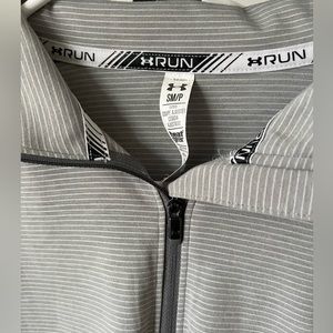 Under Armour half zip. Grey and white like new